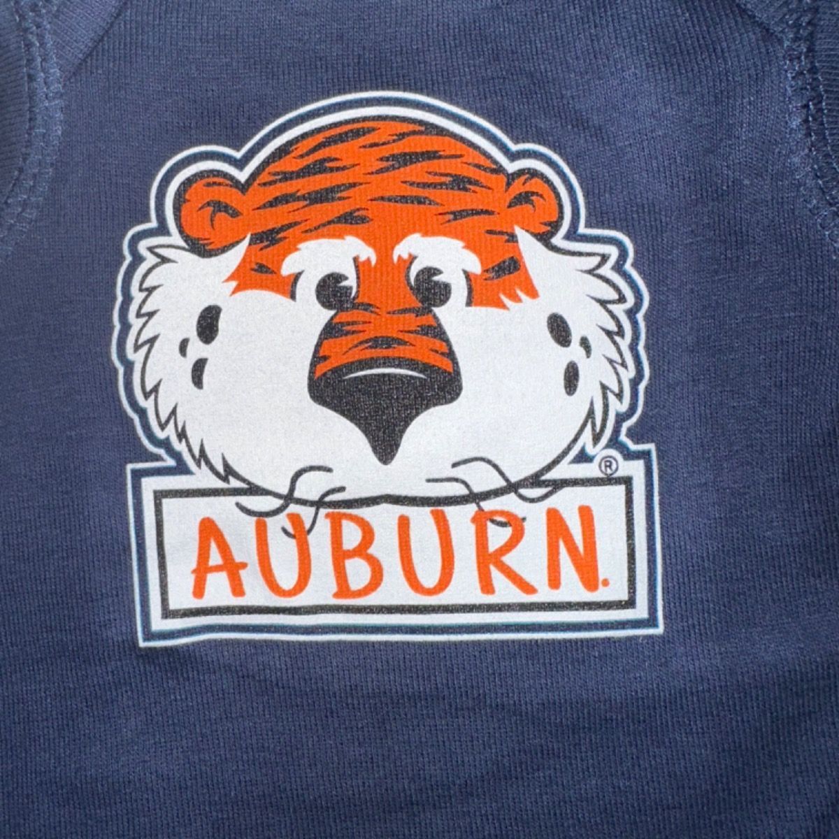 AUBIE FACE NAVY ONESIE